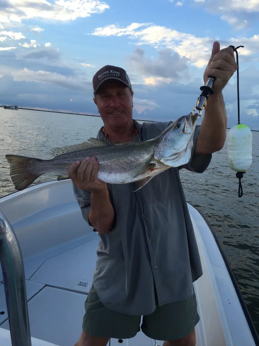 Angler with a speckled trout